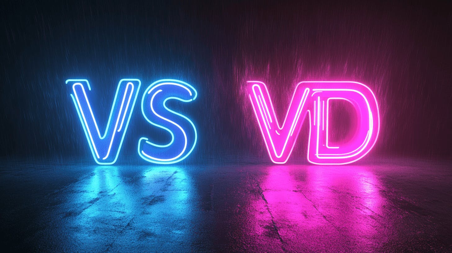 Neon letters VS and VD over a black background.