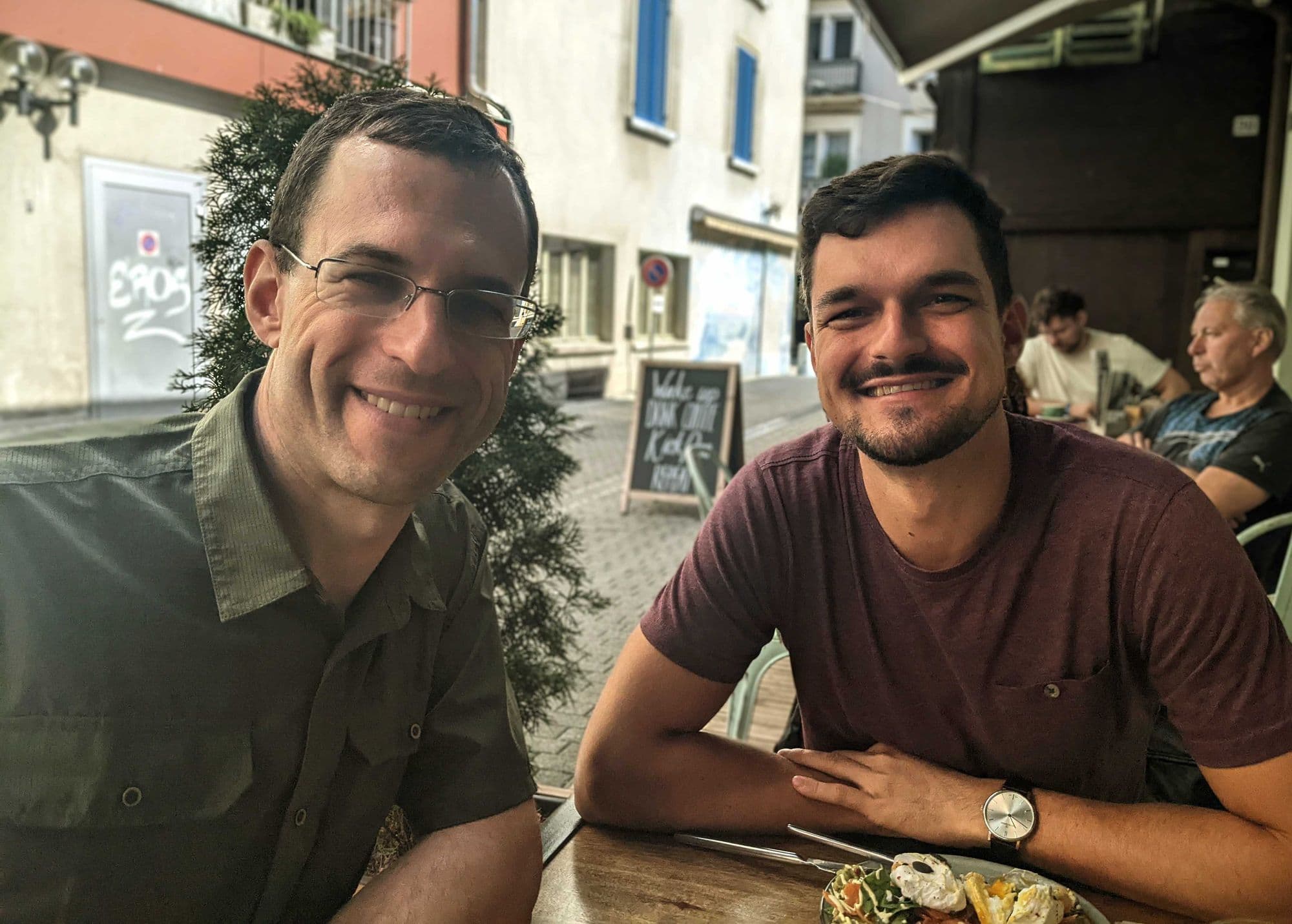 Mike and software engineer James Guthrie enjoying breakfast in Switzerland in July